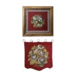 A Victorian Berlin wool and beadwork framed panel, with floral decoration, 40.5X39cm together with a