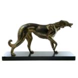 After Rochard a cast metal Borzoi. A French gilded figure of a Borzoi hound, circa 1930, modelled