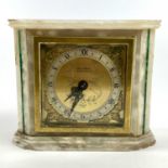 An Elliott mantel timepiece, circa 1930s, contained in a malachite inlaid white marble case and with