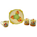 Clarice Cliff, crocus pattern, two preserve pots and covers, each of cylindrical form, height 9.5cm,