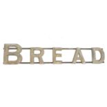 .A vintage bread advertising sign, wrought iron and gilt wood, early-mid 20th century, length