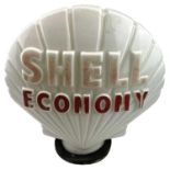 A Shell Economy glass petrol pump globe, slightly faded, height 44cm. Originally from Cowls & Sons