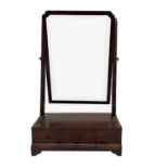 An early George III walnut toilet mirror, with bevel edge plate and moulded supports, the base