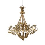 A substantial Continental yellow and gilt painted wrought iron chandelier, with twist and foliate