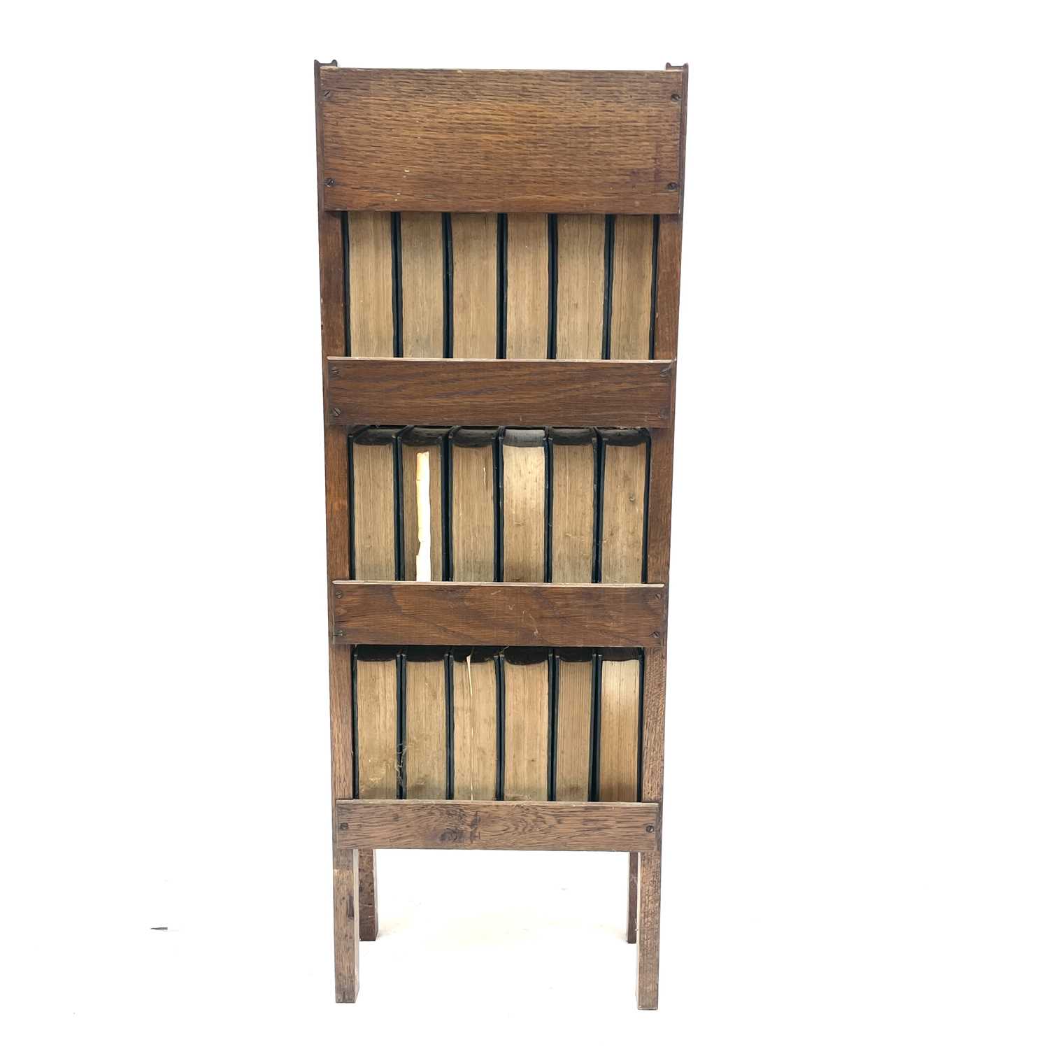 An oak narrow bookcase, early 20th century, containing 18 volumes of the Charles Dickens library, - Image 5 of 8