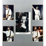 Signed Eric Clapton photographs.