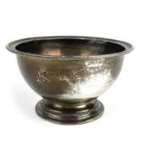 A modern silver pedestal bowl.