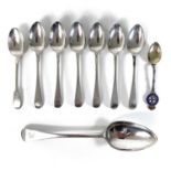 A collection of silver spoons.