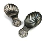 A pair of modern silver George III style caddy spoons by A C & Sons Ltd.