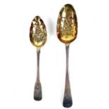 A George III silver berry spoon by Thomas and William Chawner.