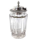 A George IV silver mounted hinge lidded glass mustard pot.
