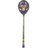 An Imperial Russian silver gilt and enamel spoon.