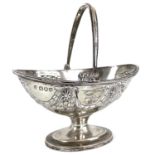 A Victorian silver swing handled pedestal sugar basket by Charles Stuart Harris.