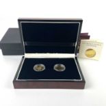 A cased set of two 2013 and 2014 full sovereign coins.