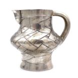 A rare Imperial Russian silver and parcel gilt trompe l'oeil cream jug by Arseny Yakovlevich Sokolov