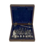 A George V silver fish knife and fork set for six in fitted box.