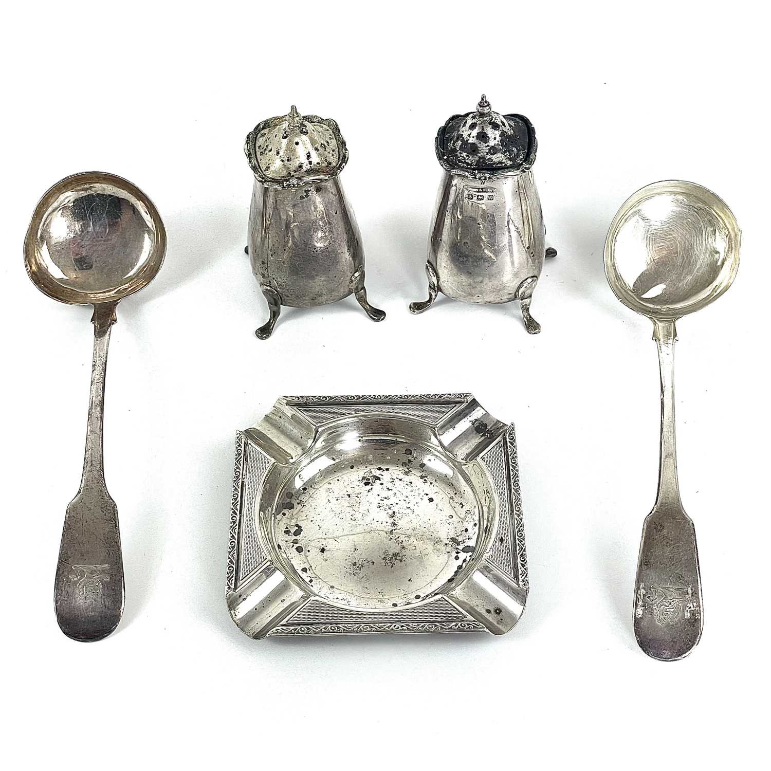 A pair of William IV Scottish silver sauce ladles by William Mortimer.