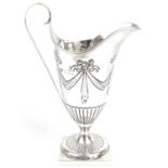 A Victorian silver Adam style pedestal cream jug by George Fricker.