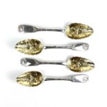 A George III Scottish silver set of four berry spoons.