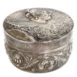 A 19th century German silver circular embossed box by Martin Sugar.