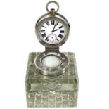 An unusual silver timepiece lidded glass inkwell.