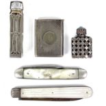 Two silver mounted scent bottles, a match case and two folding pocket knives.