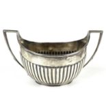 A Victorian silver twin handled sugar bowl, of half fluted form,