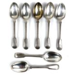 A Victorian silver set of seven fiddle and thread pattern dessert spoons.