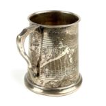 A George V silver mug by William Hutton & Sons.