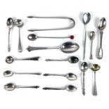 An Edwardian silver set of six teaspoons with Shakespeare bust finials.