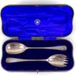 A George V silver Hanoverian pattern pair of salad serving spoons by Carrington & Co.