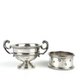 A George V silver miniature twin handled cup by James Dixon & Sons.