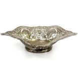 A continental .800 silver embossed and pierced dish.