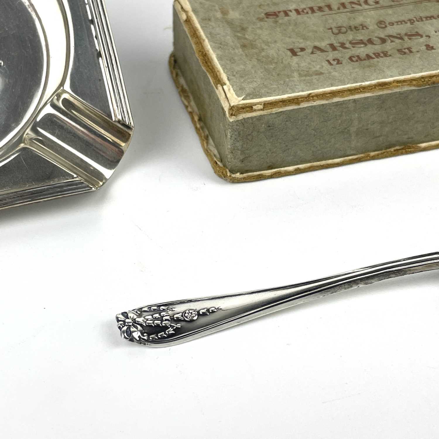 A George VI silver ashtray, a silver pepperette and a condiment spoon. - Image 5 of 6