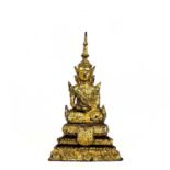 A Tibetan gilt bronze figure, 18th/19th century.