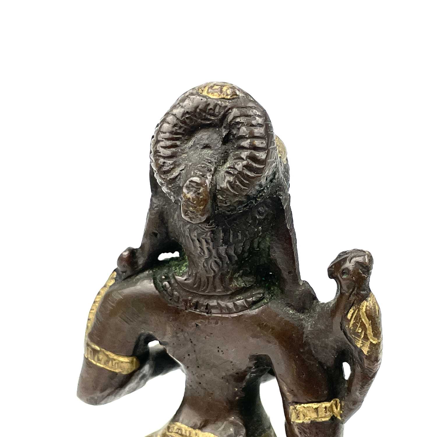 An Indian gilt bronze figural oil lamp. - Image 6 of 9