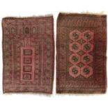 An Afghan prayer rug and another Afghan rug, circa 1920-1930's.
