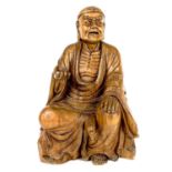 A Chinese carved hardwood figure of a seated buddha, early-mid 20th century.