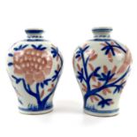 A pair of Chinese porcelain baluster vases, 20th century.