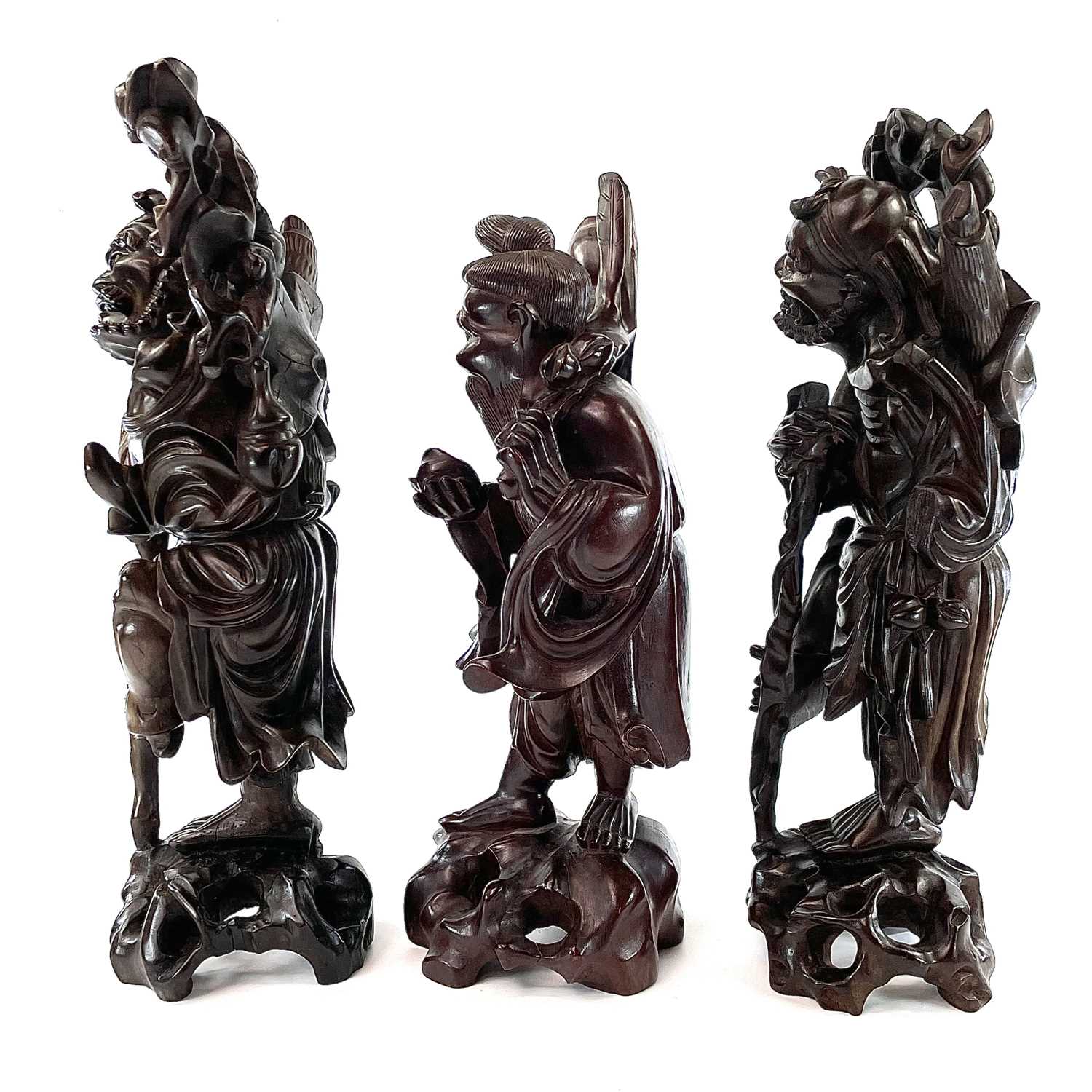 A pair of Chinese carved hardwood figures, late 19th century. - Image 3 of 7