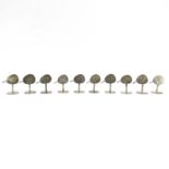 A set of ten white metal place name holders shaped as hand fans.