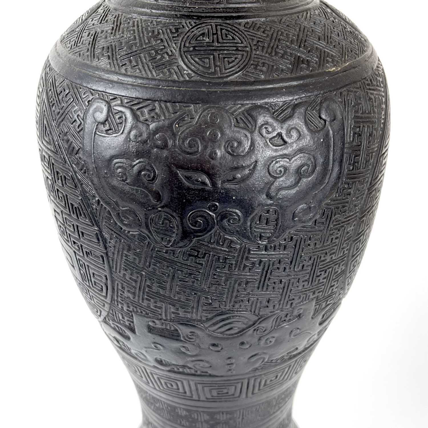 A large rare Chinese carved black porcelain vase, Qing Dynasty. - Image 8 of 16