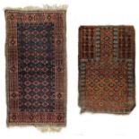 A Belouch rug and a Belouch prayer rug, circa 1900.