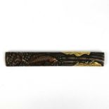 A Japanese bronze and gold kozuka, (knife handle) Edo period, signed.