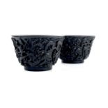 A pair of Chinese carved Zitan wood bowls.
