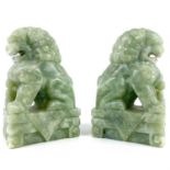 A pair of Chinese jadeite dogs of fo, 20th century.
