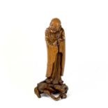 A fine Chinese rootwood carved figure, Qing Dynasty or earlier.