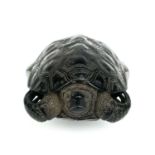 A Japanese carved wood netsuke in the form of a turtle, 19th century.