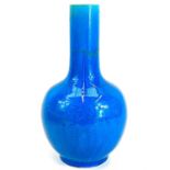 A Chinese porcelain powder blue glazed vase.