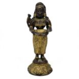 An Indian gilt bronze figural oil lamp.